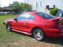 1997 Ford Mustang V-6 Custom 5-Speed - Red & Black